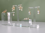 GemeShou 2pcs Acrylic earring display risers, Jewelry display riser stand, clear ring risers for display selling【2pcs 1.57 L x1.57 W x1.57 H inch】