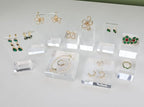 GemeShou 2pcs Acrylic earring display risers, Jewelry display riser stand, clear ring risers for display selling【2pcs 1.57 L x1.57 W x1.57 H inch】