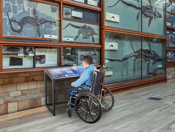 Displays2go 43" Interactive Touch Desk with PCAP Touchscreen – Digital Display Desk, Wheelchair Accessible, Touchscreen Kiosk for Retail & Education – Black