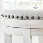 Signature Design by Ashley Valebeck Casual Upholstered Swivel Stool, Round Metal Footrest, Nailhead Trim Detail, Wood, 24", White & Black
