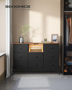SONGMICS Dresser for Bedroom, Fabric Dresser with Power Outlets and LED Lights, TV Stand for up to 60 Inch TVs, 25 Colors, 11.8 x 47.2 x 31.3 Inches, Ink Black and Rustic Brown ULTS518B01