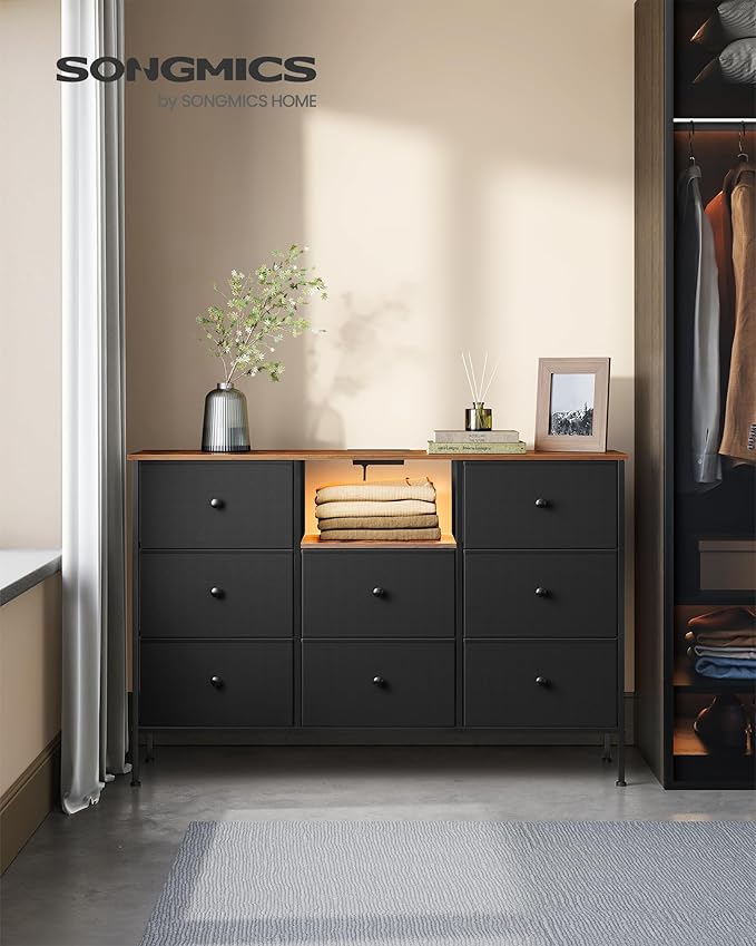 SONGMICS Dresser for Bedroom, Fabric Dresser with Power Outlets and LED Lights, TV Stand for up to 60 Inch TVs, 25 Colors, 11.8 x 47.2 x 31.3 Inches, Ink Black and Rustic Brown ULTS518B01