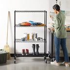 Amazon Basics 4-Shelf Adjustable, Heavy Duty Storage Shelving Unit on 3'' Wheel Casters, Metal Organizer Wire Rack, 36" L x 14" W x 57.75" H, Black